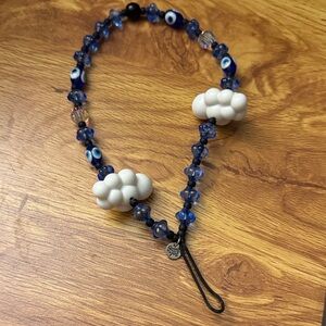 String Ting phone wristlet